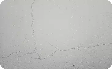 Étapes techniques de traitement et rebouchage de fissures de façade par Elka